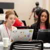 students looking at computers